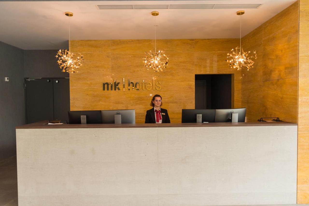 Mk Hotel Tirana Rinas エクステリア 写真 Reception desk at a hotel