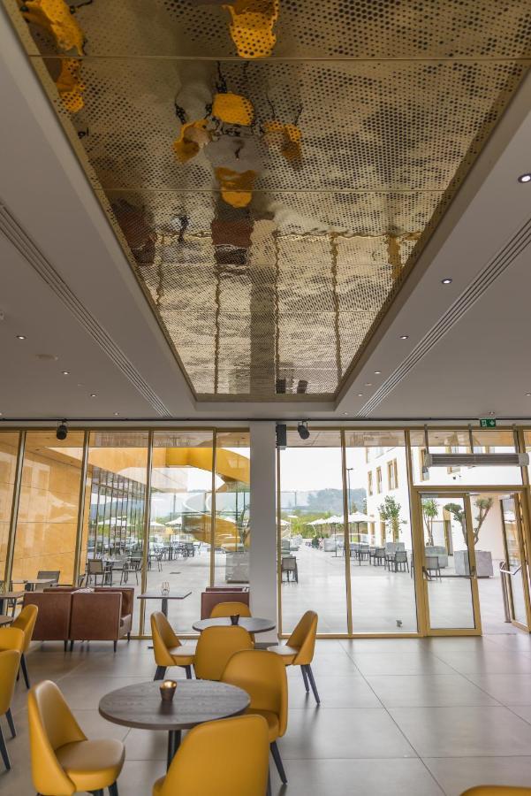 Mk Hotel Tirana Rinas エクステリア 写真 The ceiling of the lobby