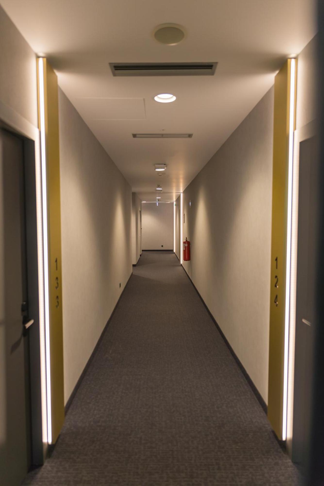 Mk Hotel Tirana Rinas エクステリア 写真 A corridor in the new building